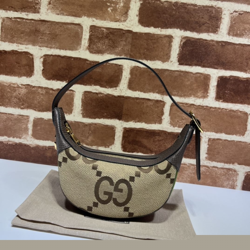 G*u*i top handle bags